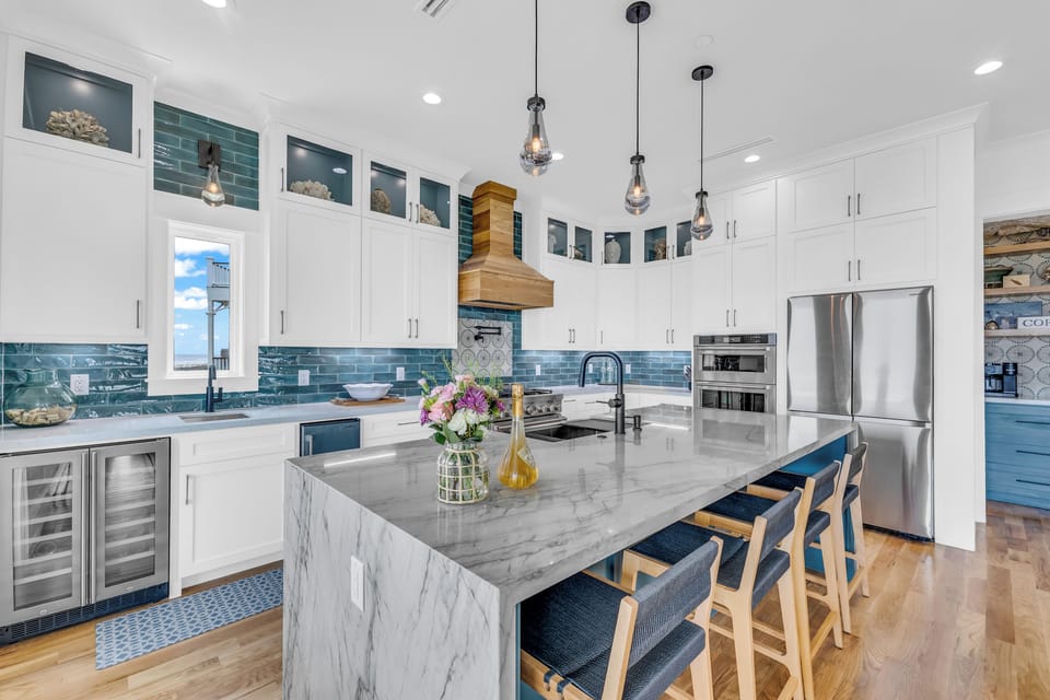 Oceanfront kitchen:high-end appliances, a coffee bar, a wine fridge, dual ovens.