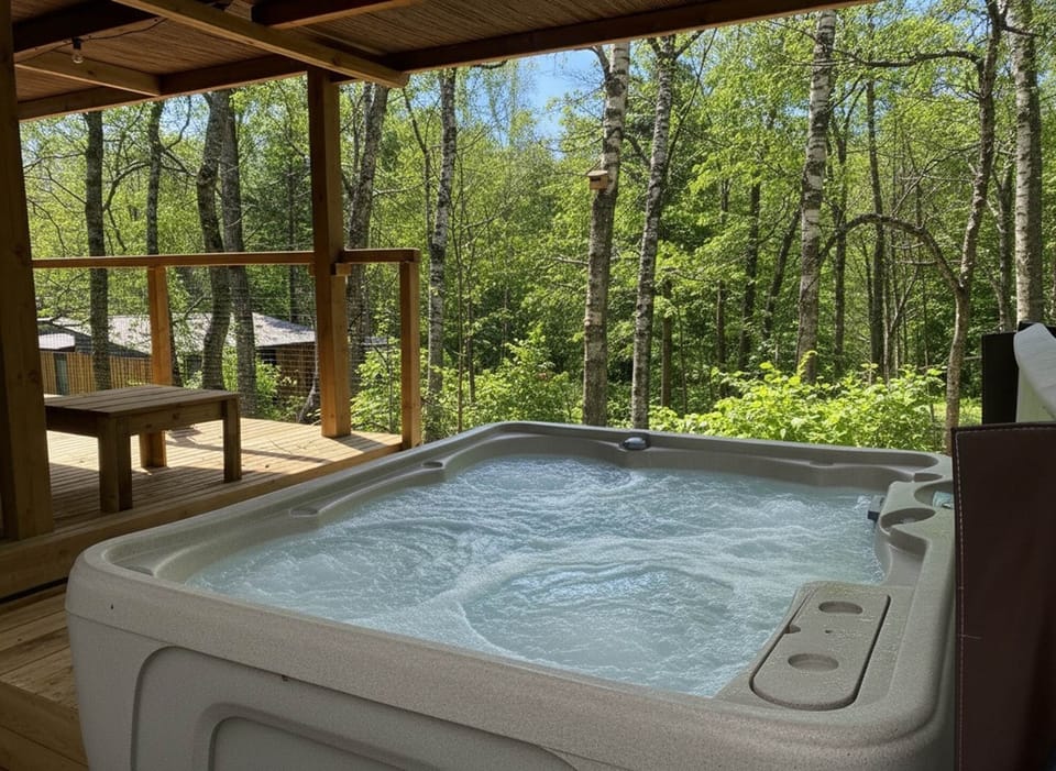 Spa privatif chauffé à 38°C avec vue sur la Forêt
