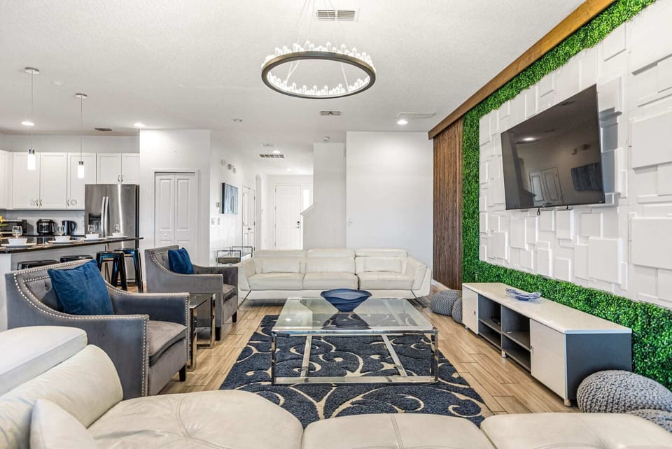 Bright Living Room Featuring A Smart TV And Contemporary Design