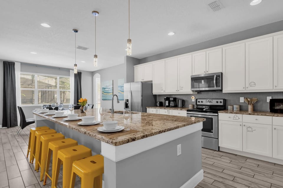 Open-Concept Kitchen With Ample Counter Space And Seating For Gatherings
