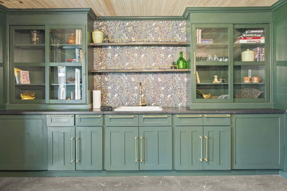 Custom wet bar in lounge space with games and plenty of books