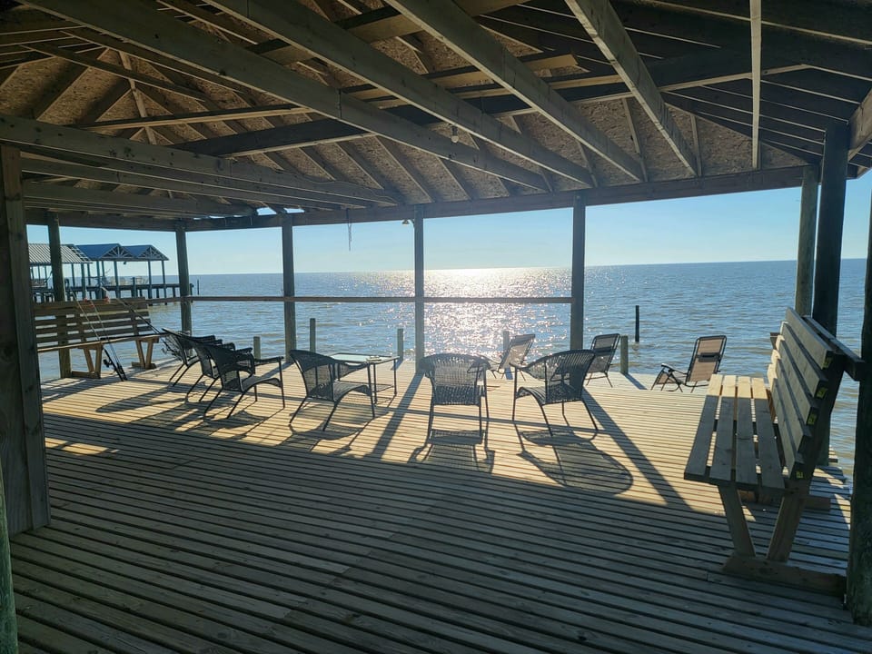 Plenty of places to sit on the wharf. Here, it's late afternoon.
