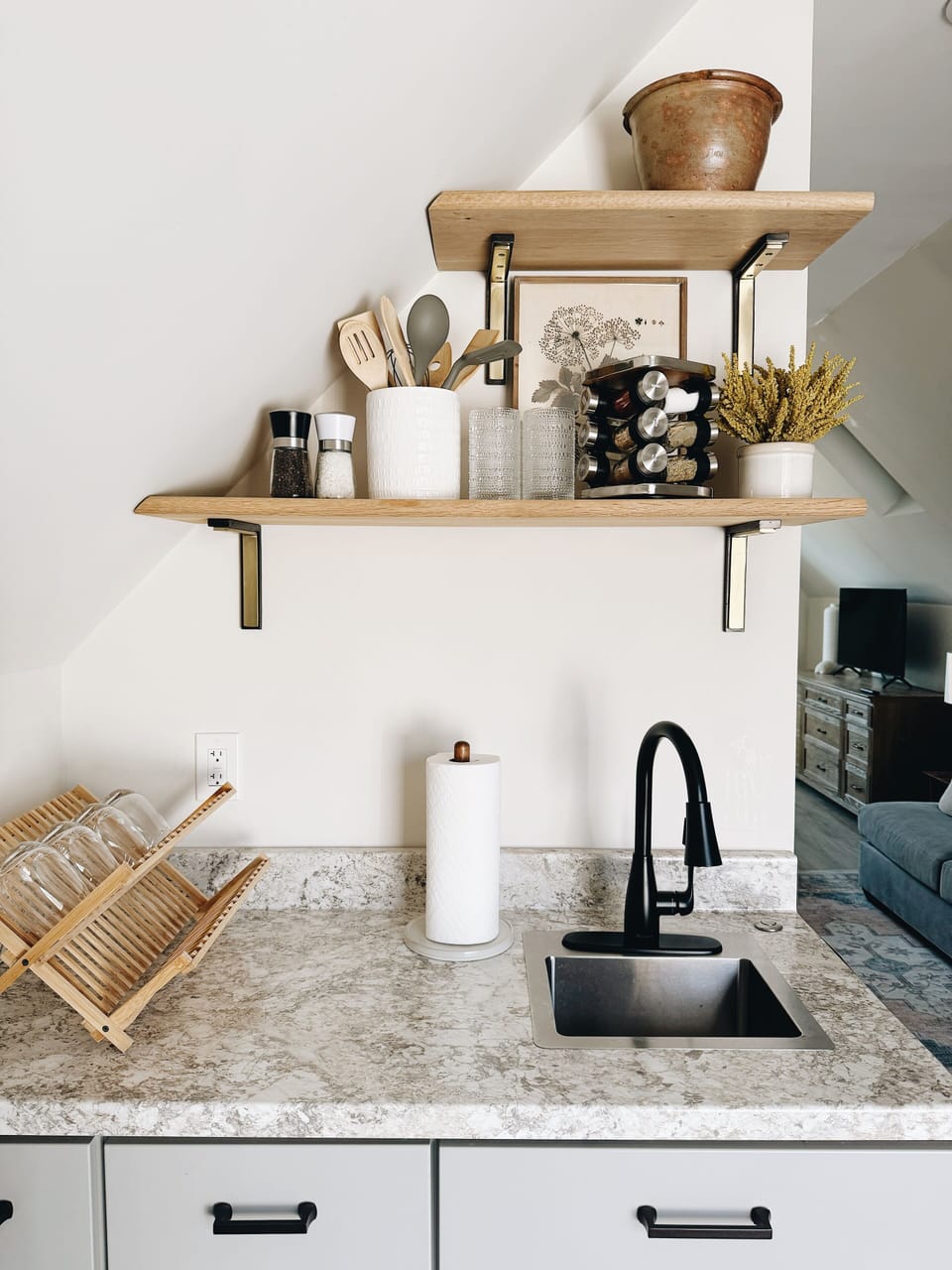 Fully stocked kitchen with cooking utensils, cookware, spices, and more. 