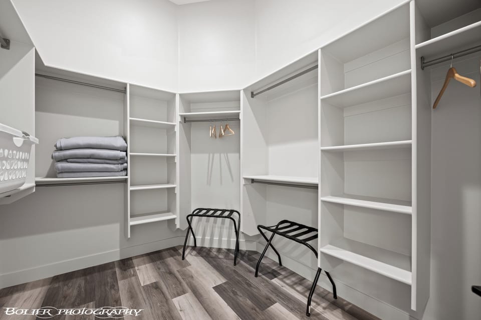 Walk in closet off bathroom for double queen room