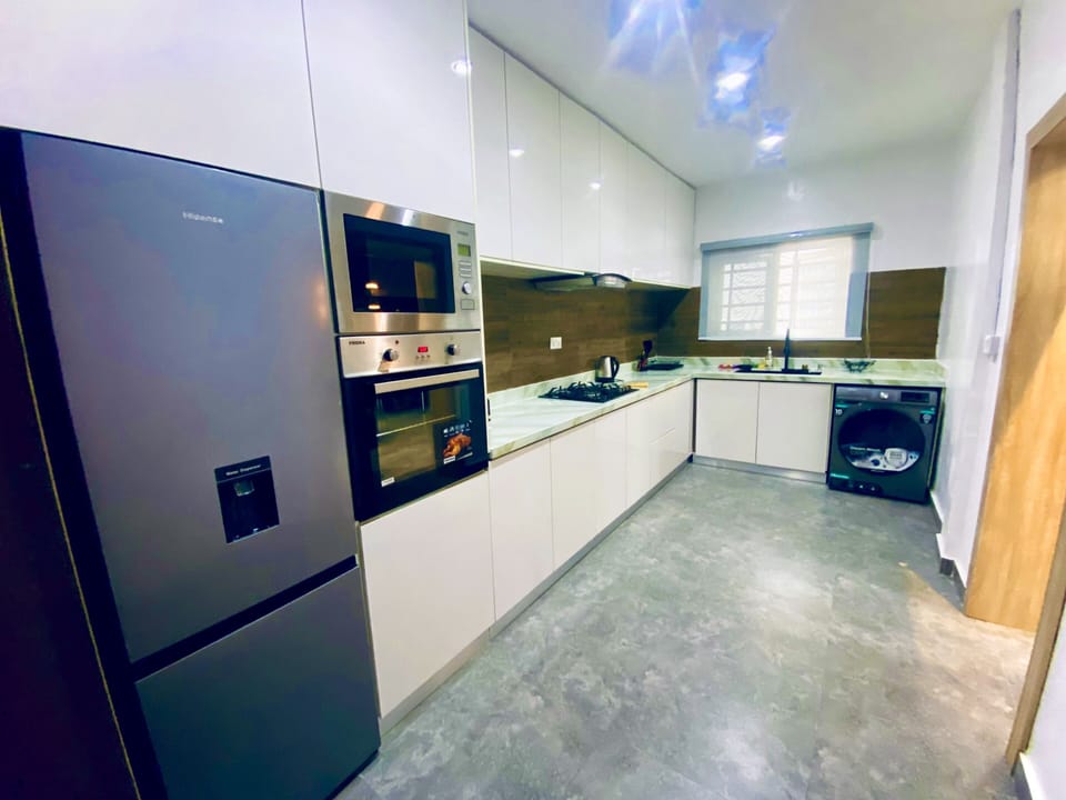 Huge kitchen - refrigerator, freezer, microwave, oven, cooker, washer/dryer