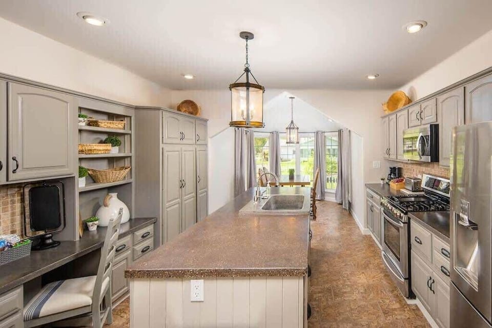 No expenses spared in our fully updated Kitchen with high end appliances and beautiful custom concrete sink and countertops.  Fully equipped for you to cook your home-cooked meals like you're in your own kitchen.