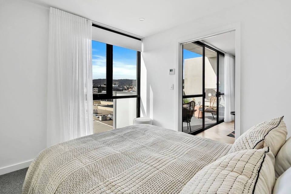 Draw the curtains and enjoy a peaceful night's sleep on a queen-size bed.