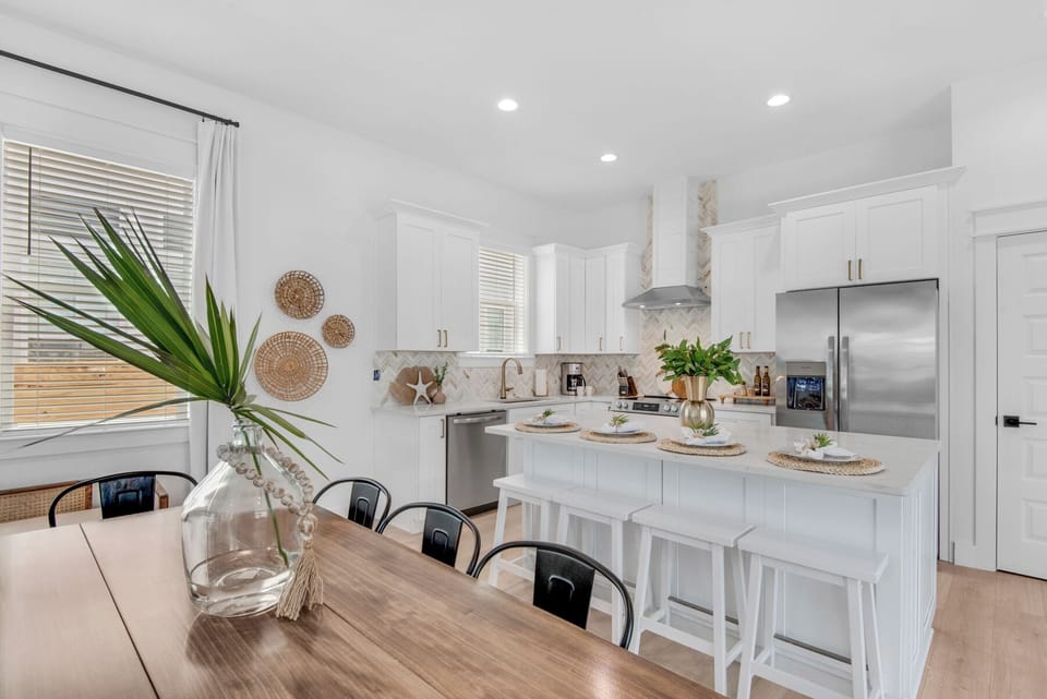 The kitchen island has additional seating.