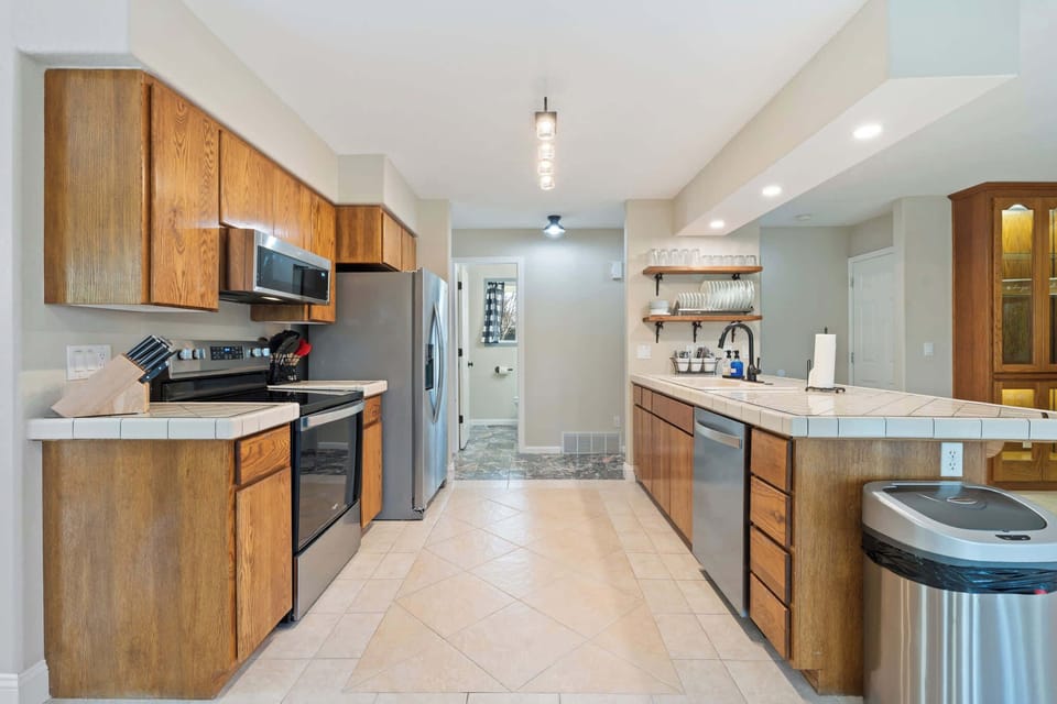 Fully Equipped Kitchen with Stainless Appliances & Everyday Essentials