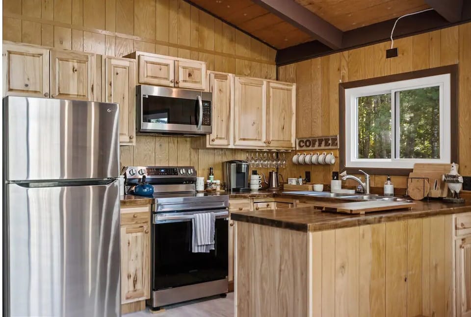 Cook your meals with a lovely forest view, and surrounded by your friends or family