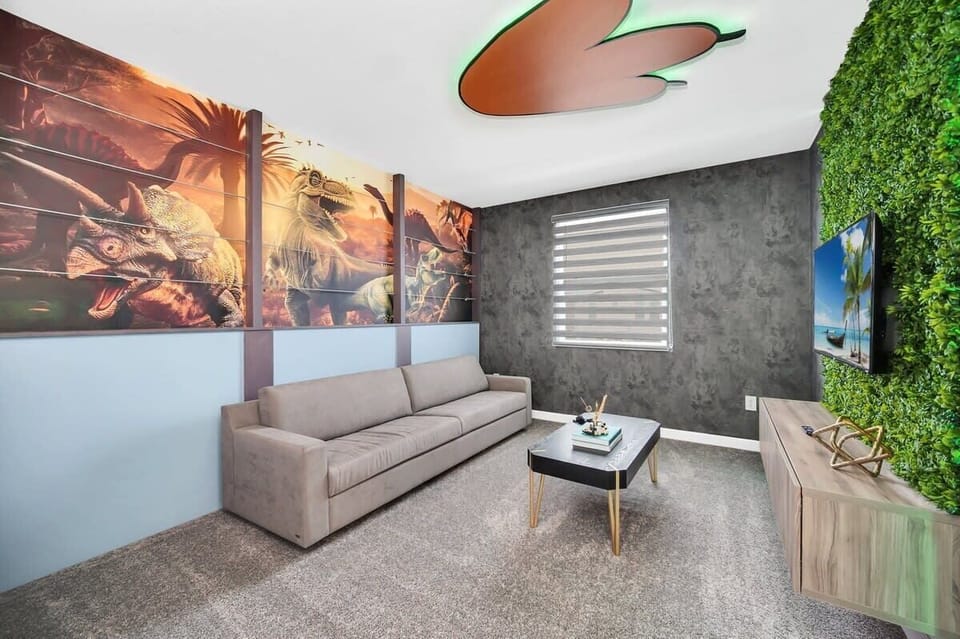 Kick back in the spacious living room with comfortable furniture, a large flat-screen TV, and complimentary high-speed Wi-Fi for the ultimate vacation experience.