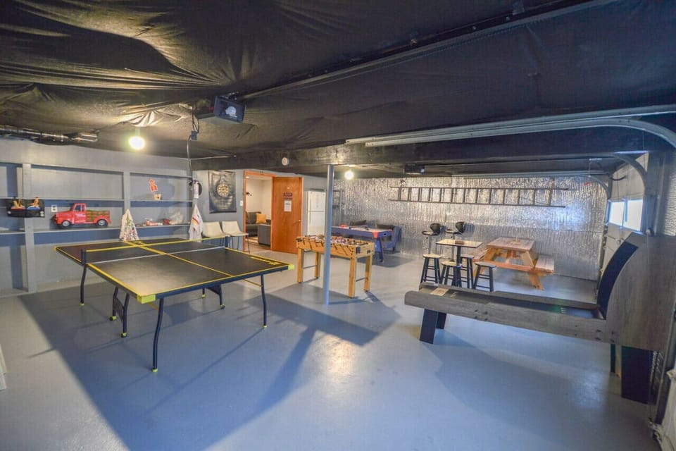 Our garage game room has everything! A ping pong table, foosball, air hockey,  darts, and skee ball!  You'll have hours of fun in here!