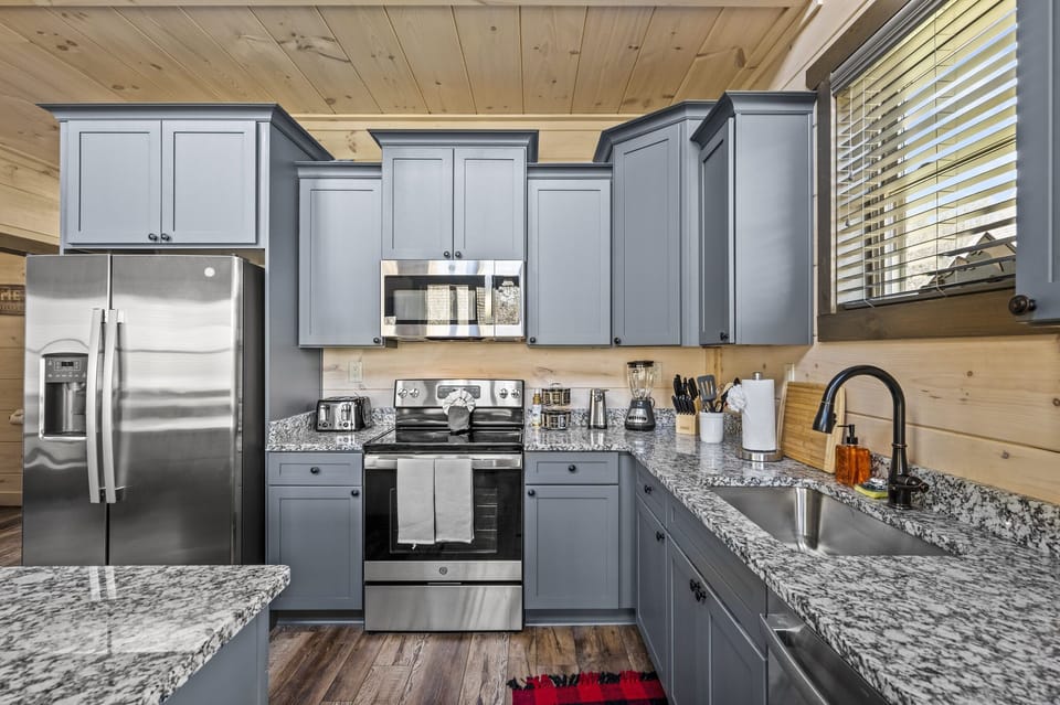 Cabin By The Creek's fully equipped kitchen