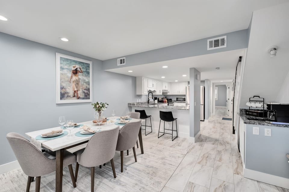 Enjoy family meals in the elegant dining area that seats 6 at the table and 2 at the bar. We also provide a high chair for the babies not pictured here.