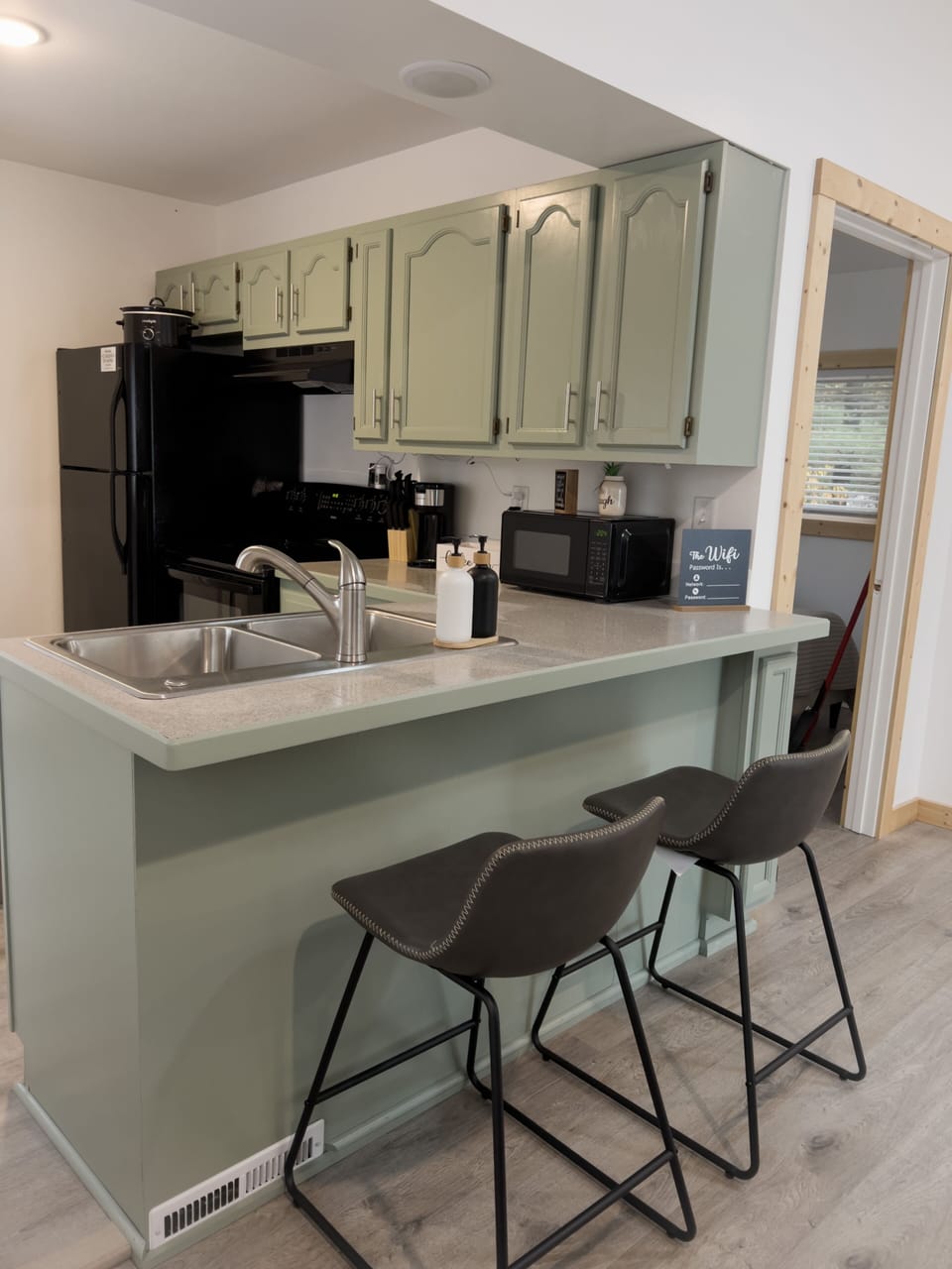 Kitchen with 2 Bar Stools 