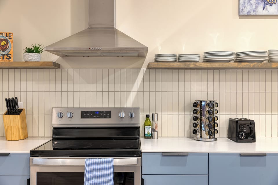 Whip up breakfast in this modern, open kitchen.