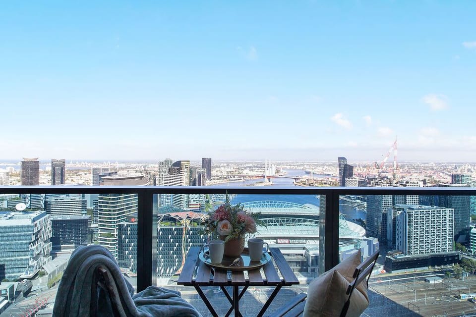 Enjoy the view of Docklands harbour from the balcony.