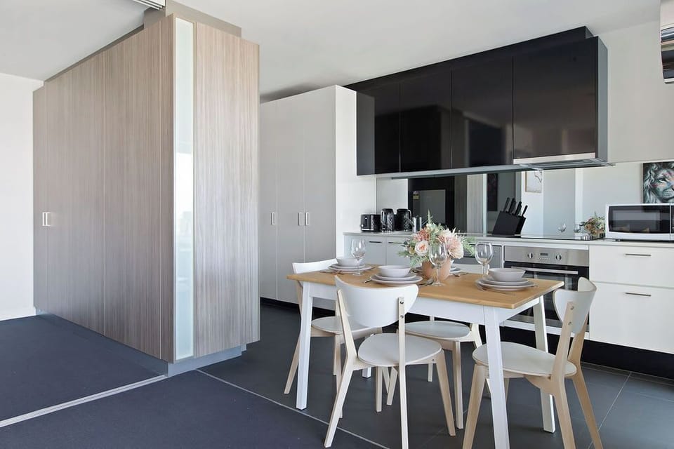 An equipped kitchen & dining area.