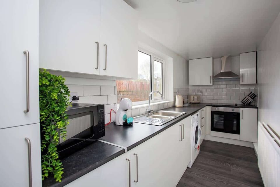 Revel in the convenience of a fully equipped kitchen with all modern facilities, including state-of-the-art appliances, ample counter space, and a variety of cooking utensils. 