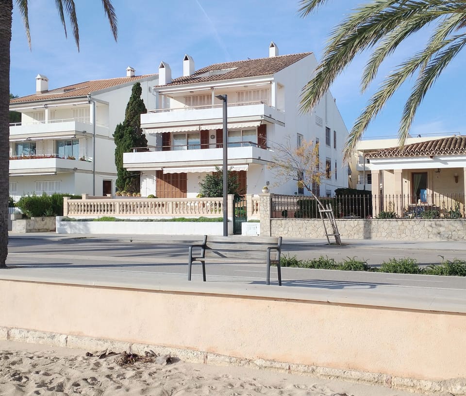 block as seen from beach, apartment at the rear