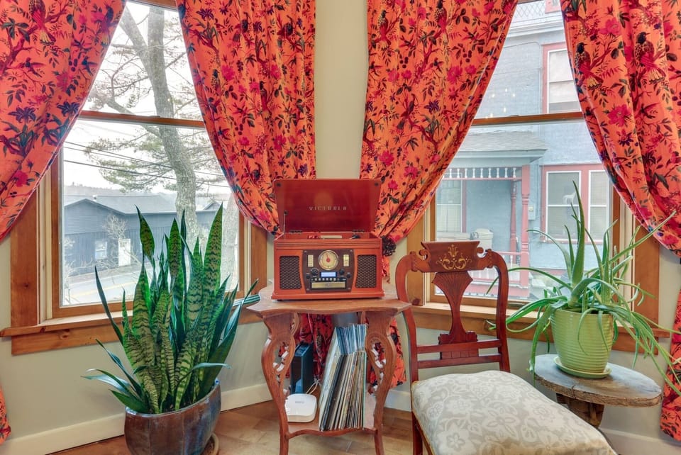 Put on a record, pour a drink, and settle into the vintage parlor