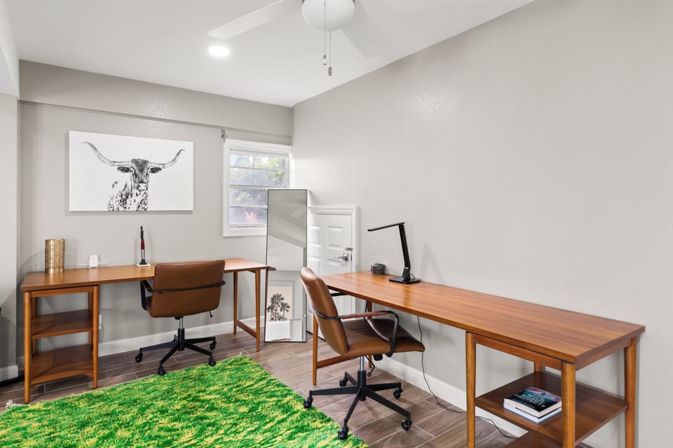 Master office with designated workspace