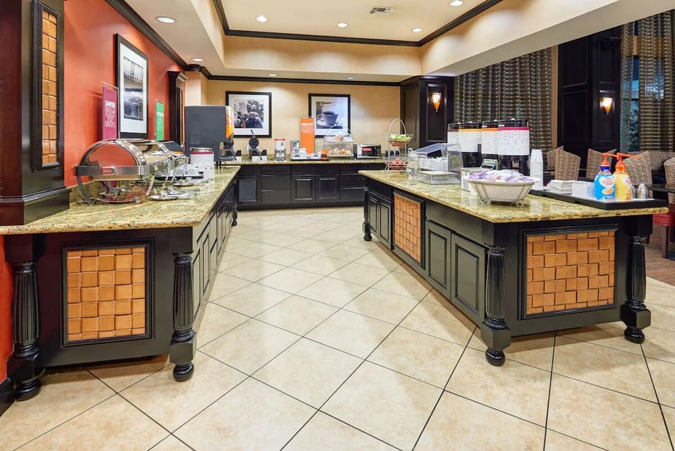 Sip coffee leisurely in the bright breakfast area seating.