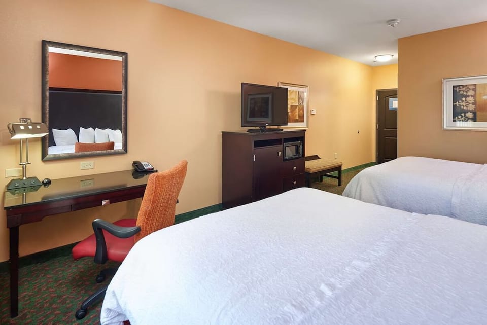 Unwind after adventures with a dedicated desk and relaxed seating.