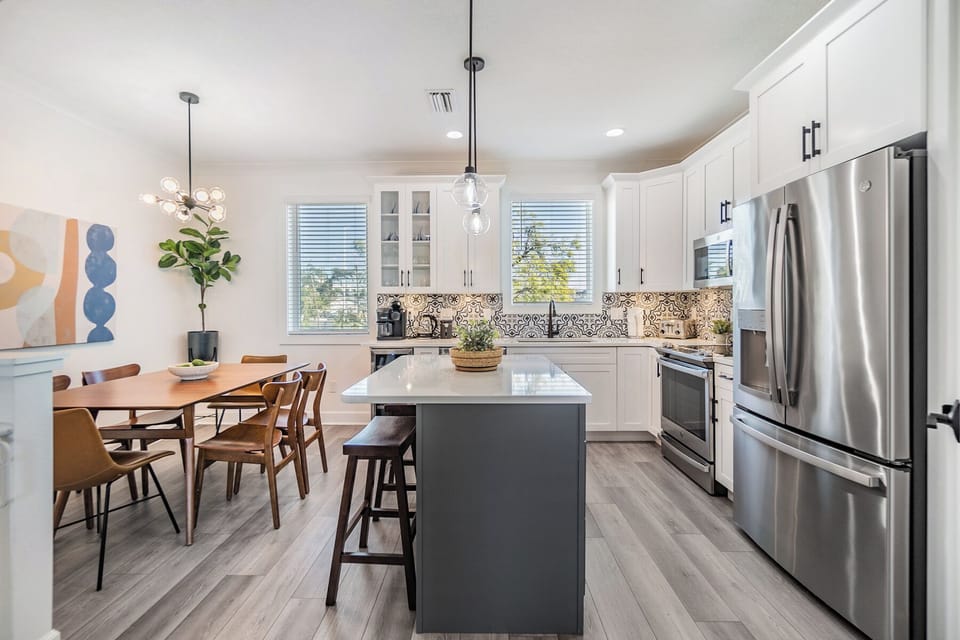 Fully Stocked Kitchen with Stainless Steel Appliances, Coffee Maker, Wine Fridge, and Dishwasher
