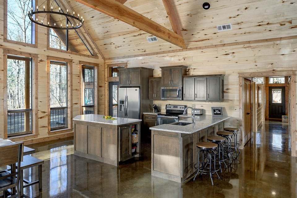 The kitchen has an island as well as 4 additional seats at the bartop.