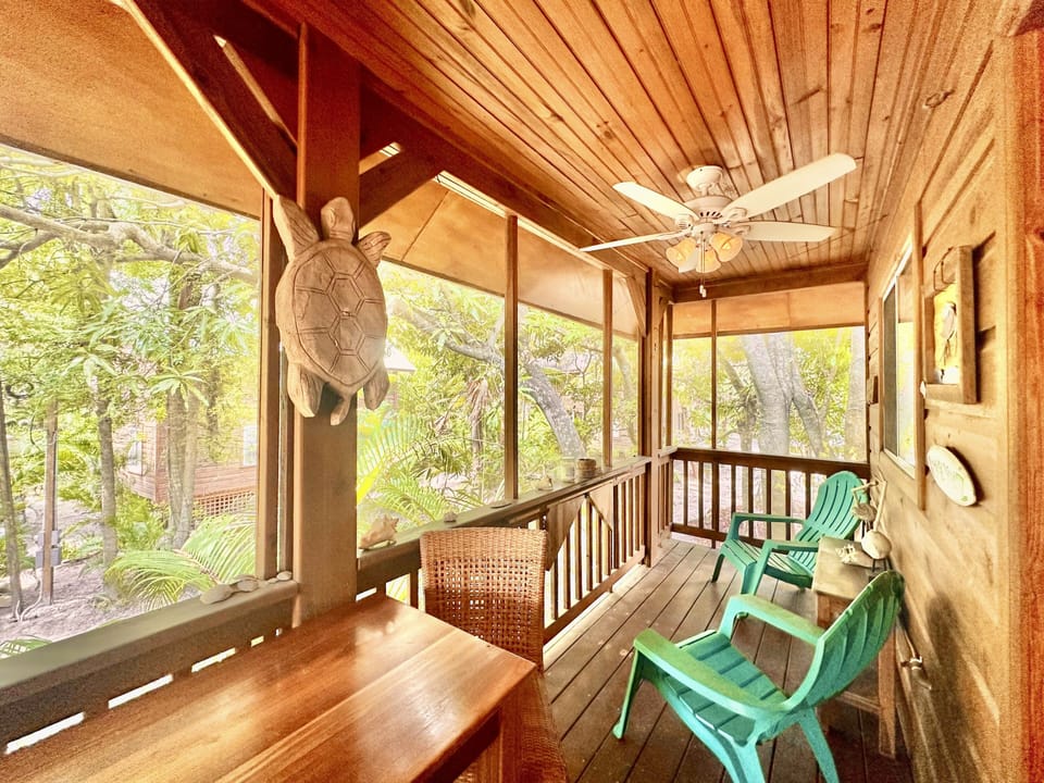 Breezy porch area to relax in nature and zip your morning coffee.  