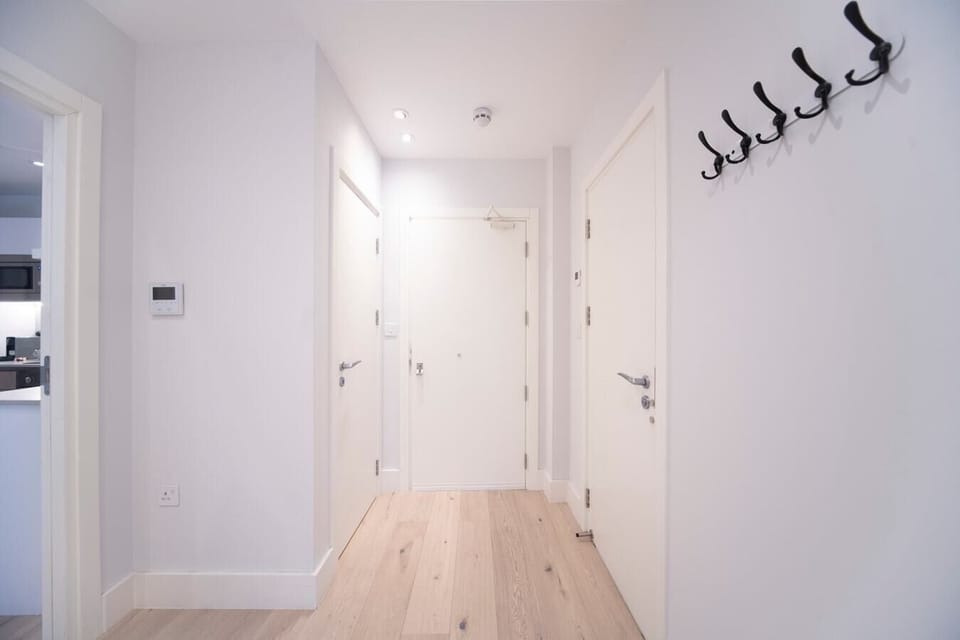 Entrance hall with laundry room including washing machine