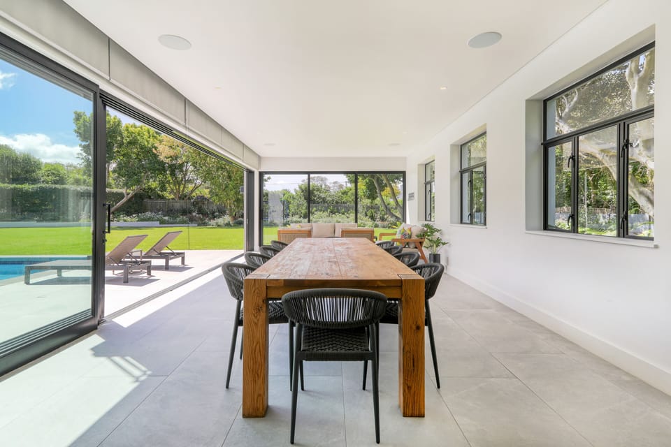 10 seater dining table in the undercover sunroom 
