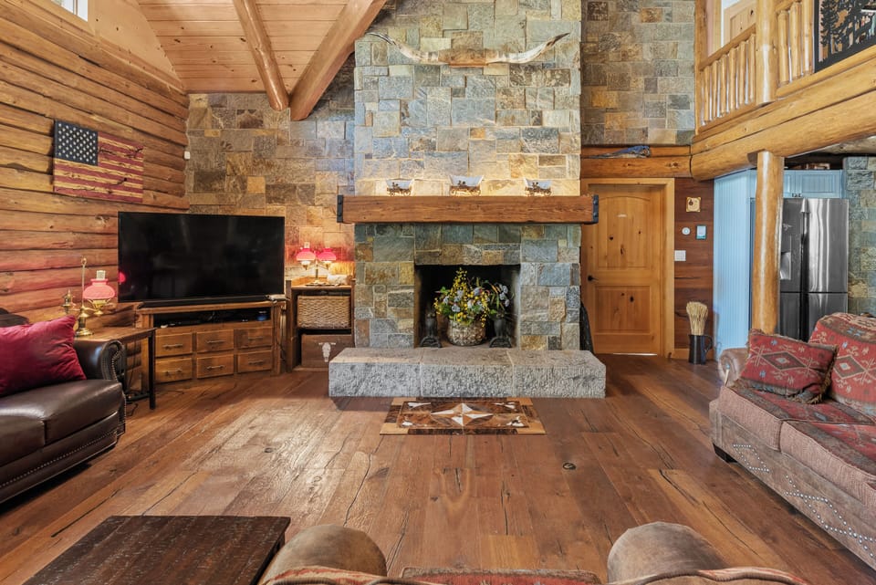 Grand stone fireplace.