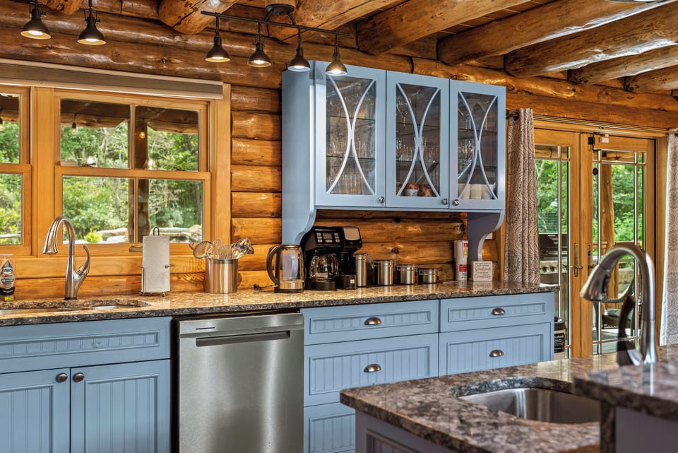 Sleek kitchen with granite countertops.