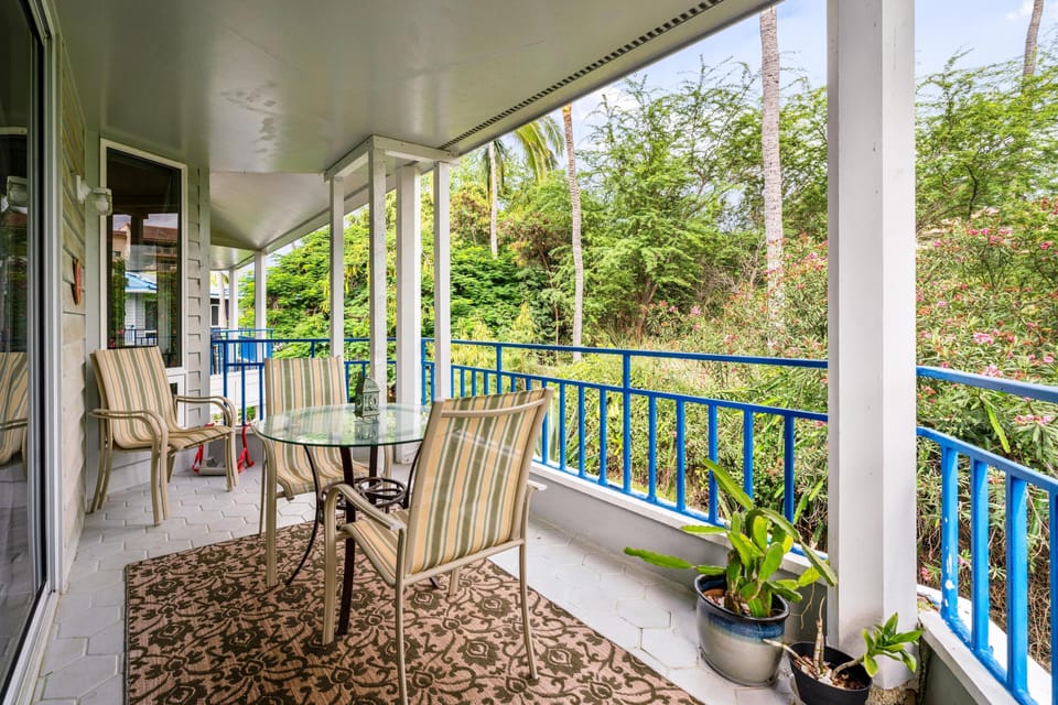 Each bedroom opens to its own lanai — quiet spots for reading, morning coffee, or evening relaxation.