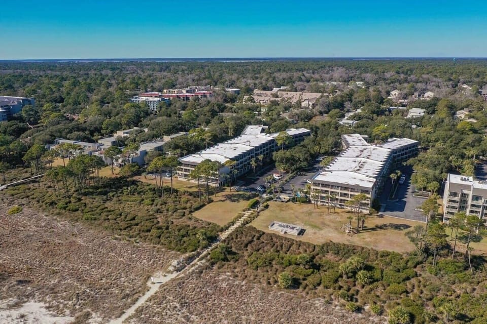Scenic walkway leading directly to the beach for easy access.