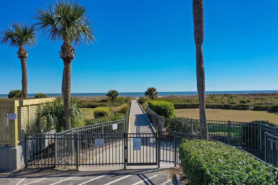Walk straight to the sandy shores from the property.