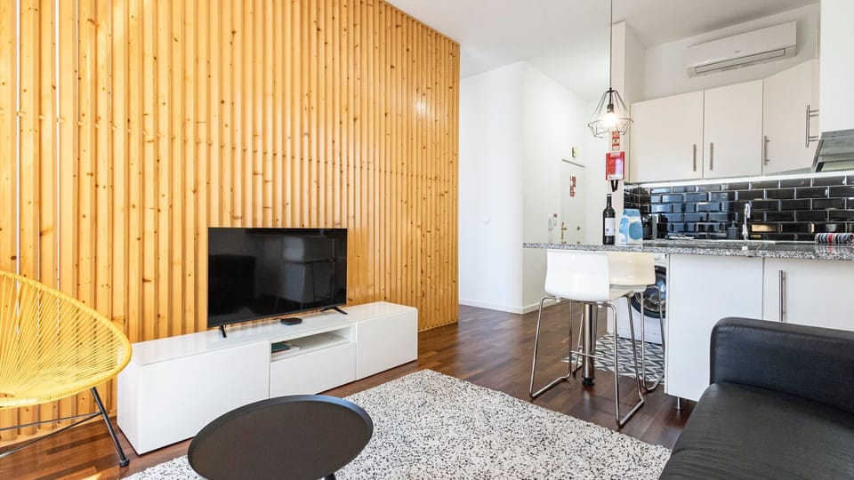 Whether you're sipping coffee by the window or lounging on the sofa, relaxation is guaranteed in our comfortable living area #TV #airbnb