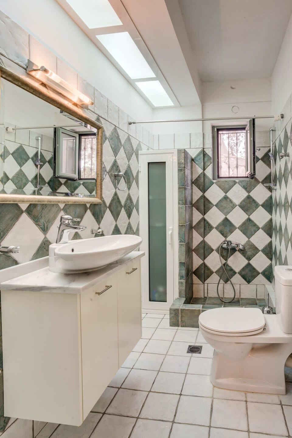 Elegant Bathroom with Natural Materials
Wood and stone combine to create a spa-like feel.