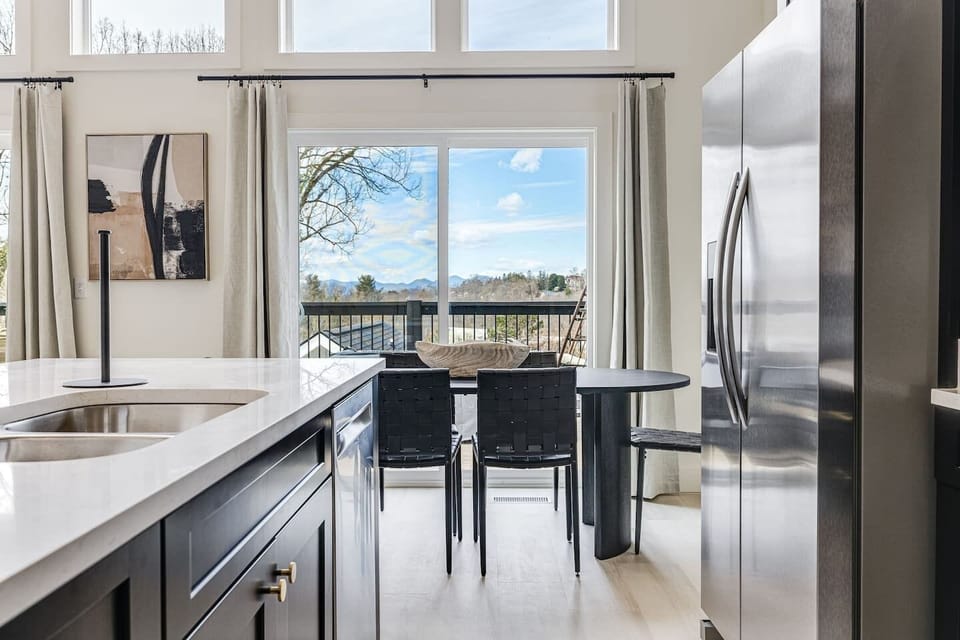 Plenty of space for moving in the kitchen, with the stove, sink, and refrigerator all next to each other!