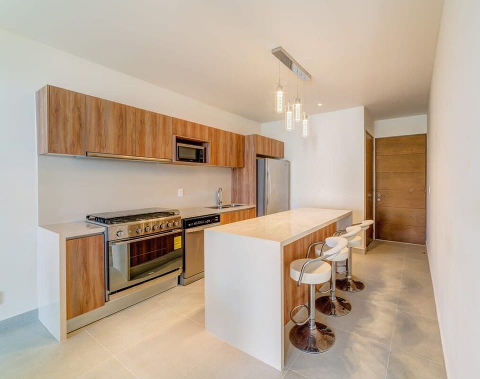 Breakfast bar seating at the kitchen counter for a quick snack or maybe to work on your laptop