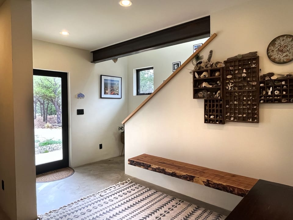 Entryway and staircase to top level