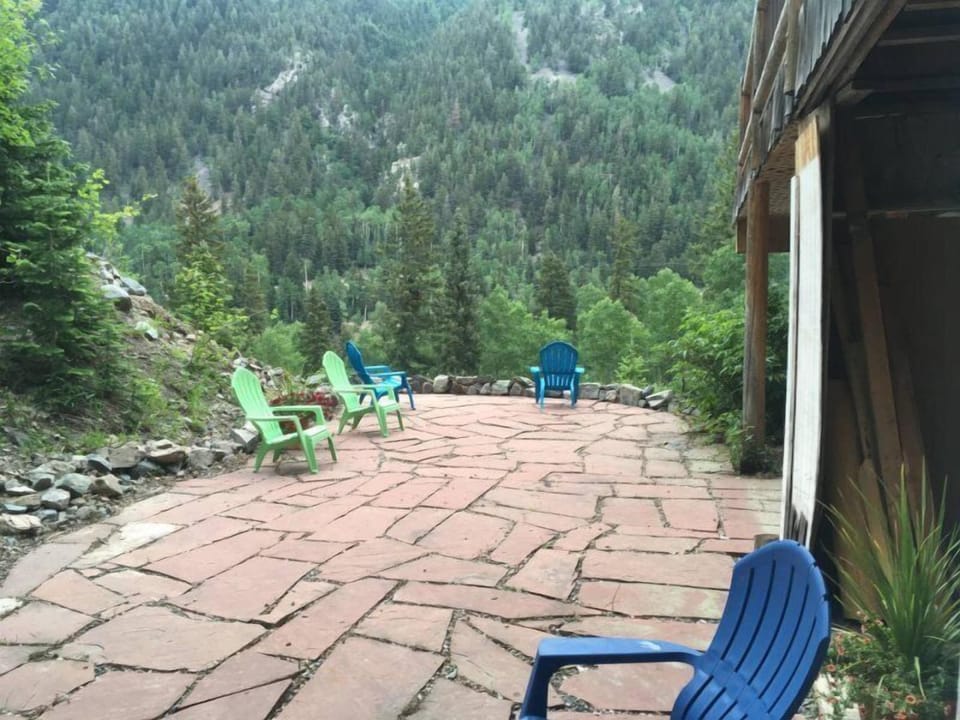 Flagstone Patio for Soaking Up the Valley Summer Time with Deck Chair Seating