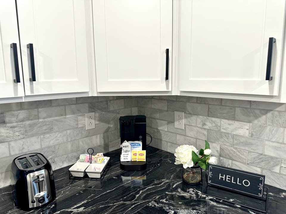 Complimentary coffee, tea, hot chocolate, sugars and creamers. Electric kettle