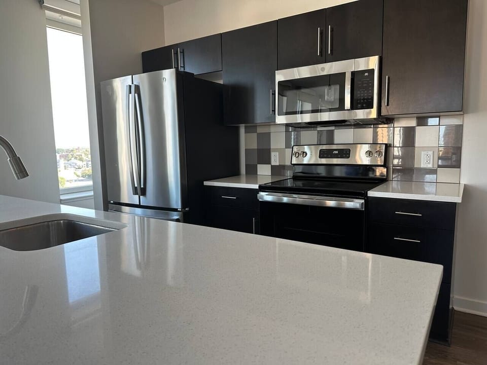 Galley kitchen with brand new stainless steel applainces
