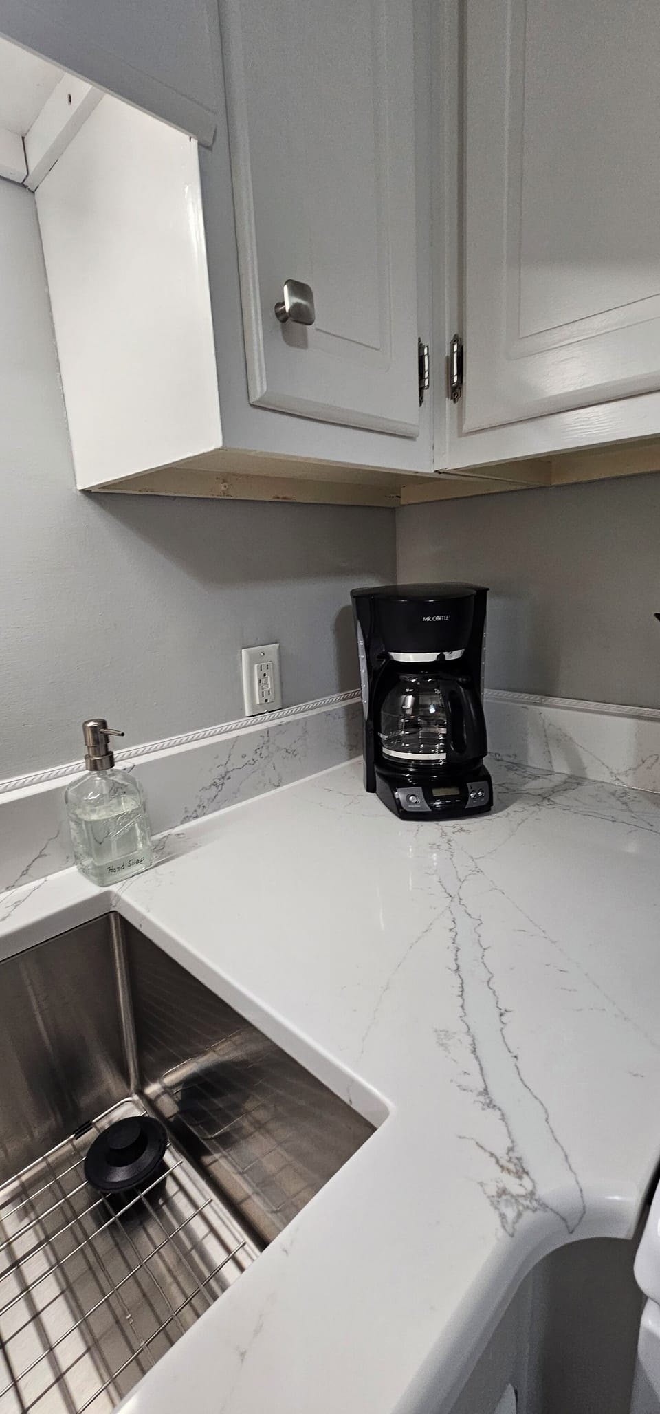 Coffee Pot. There is another, smaller one in the cabinet.