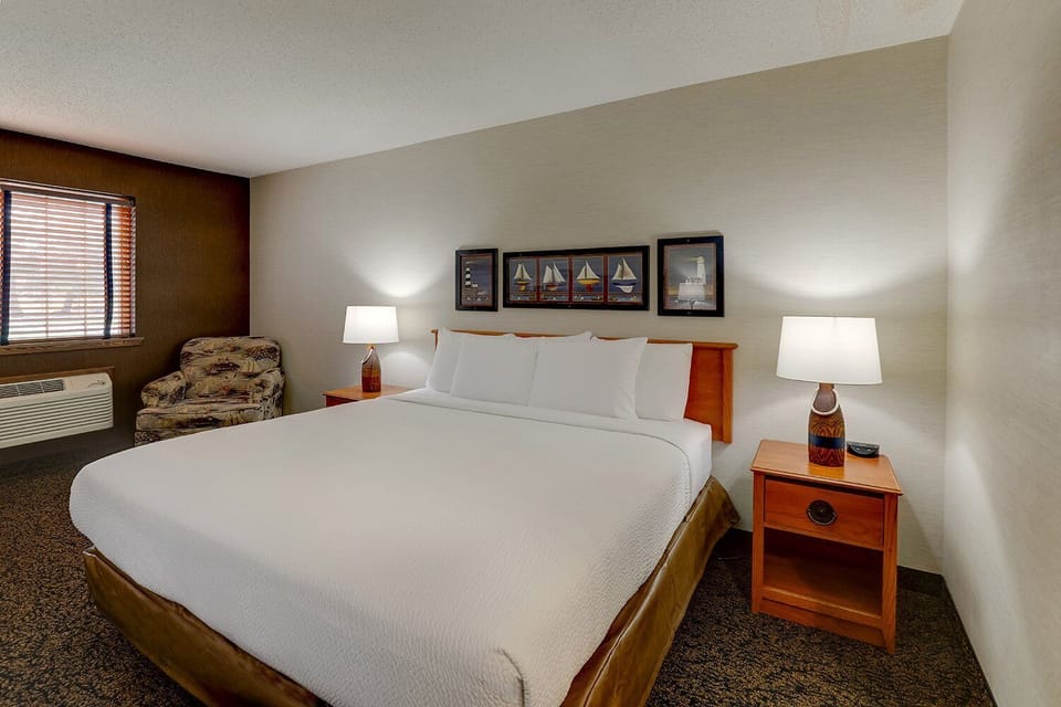 Sink into crisp king-bed comfort after a full day.