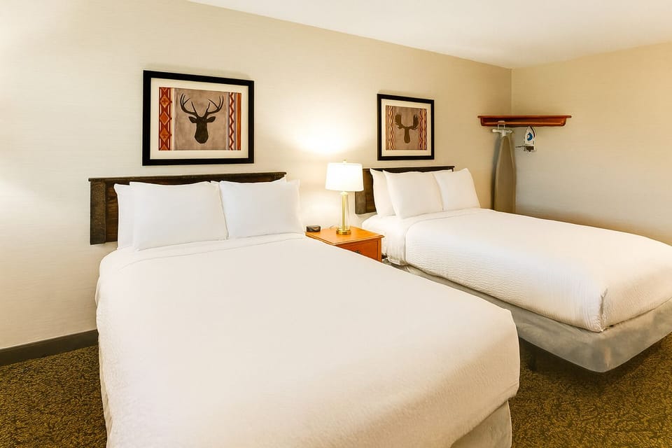 Kick back in a bright double-queen room made for comfort.