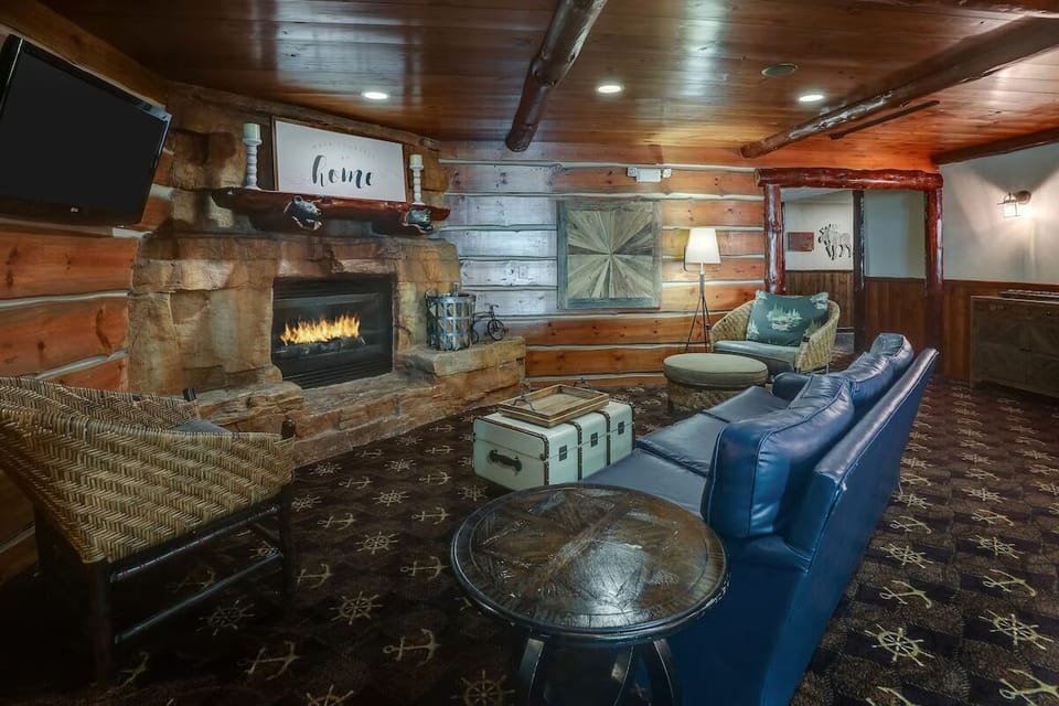 Unwind by the crackling stone fireplace after a full day.